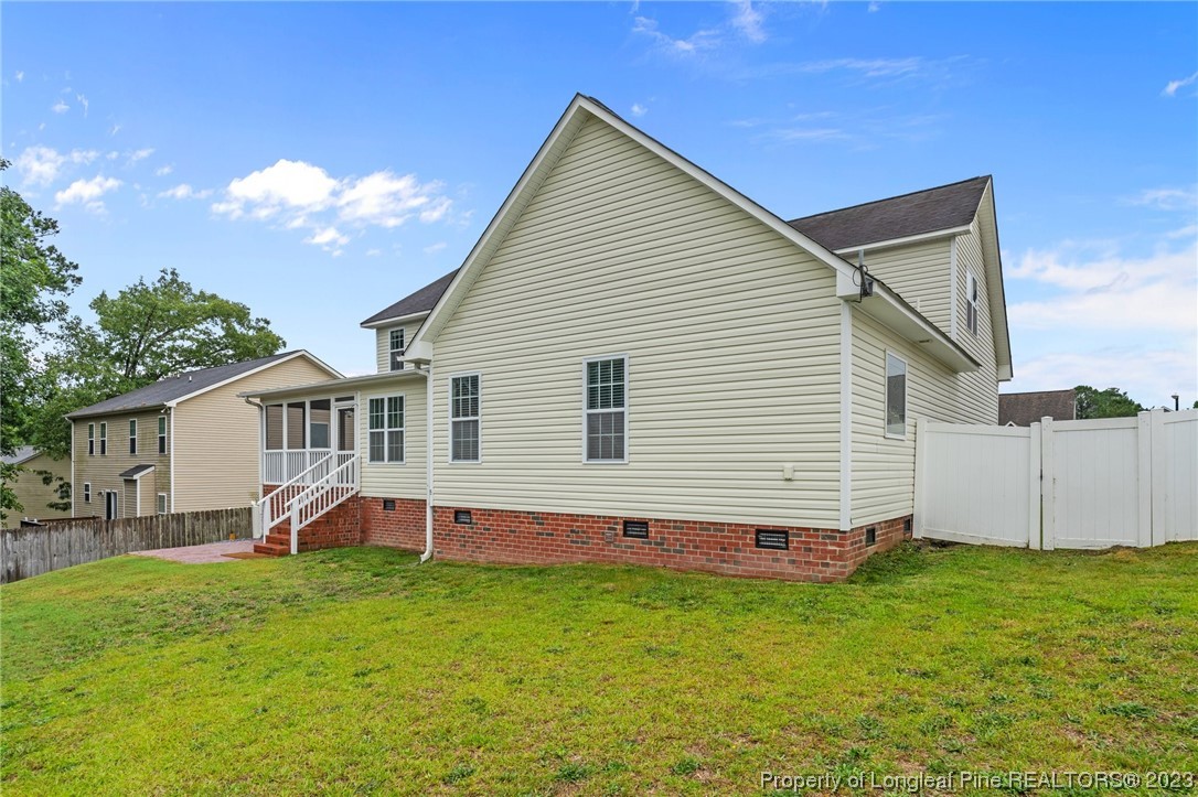 195 Culpepper Road Cameron, NC 28326 - Photo 41 of 46 a front view of house with yard and outdoor seating