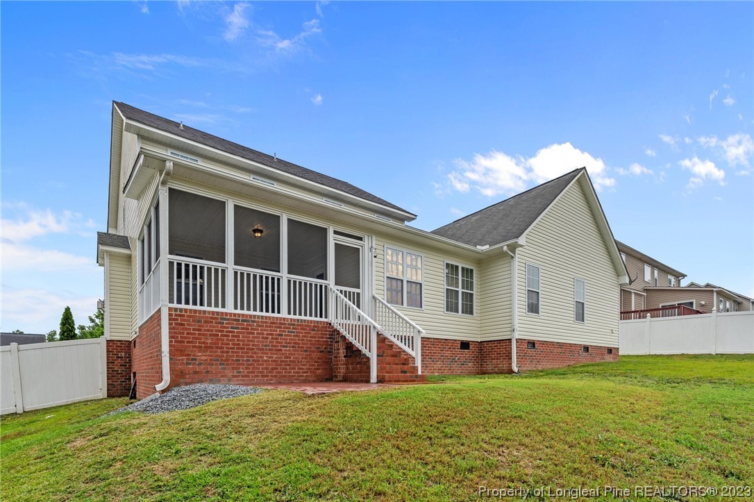 195 Culpepper Road Cameron, NC 28326 - Photo 42 of 46 a view of a house with a backyard