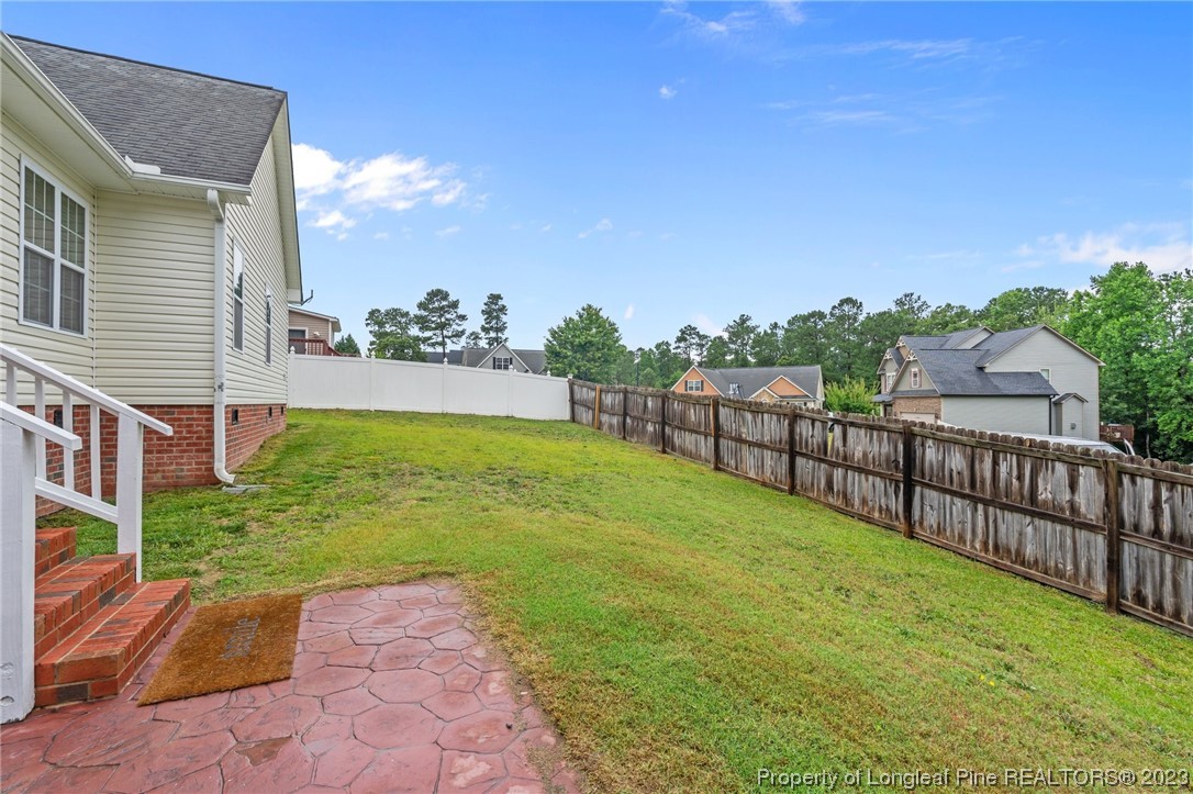 195 Culpepper Road Cameron, NC 28326 - Photo 43 of 46 a view of a backyard with a garden