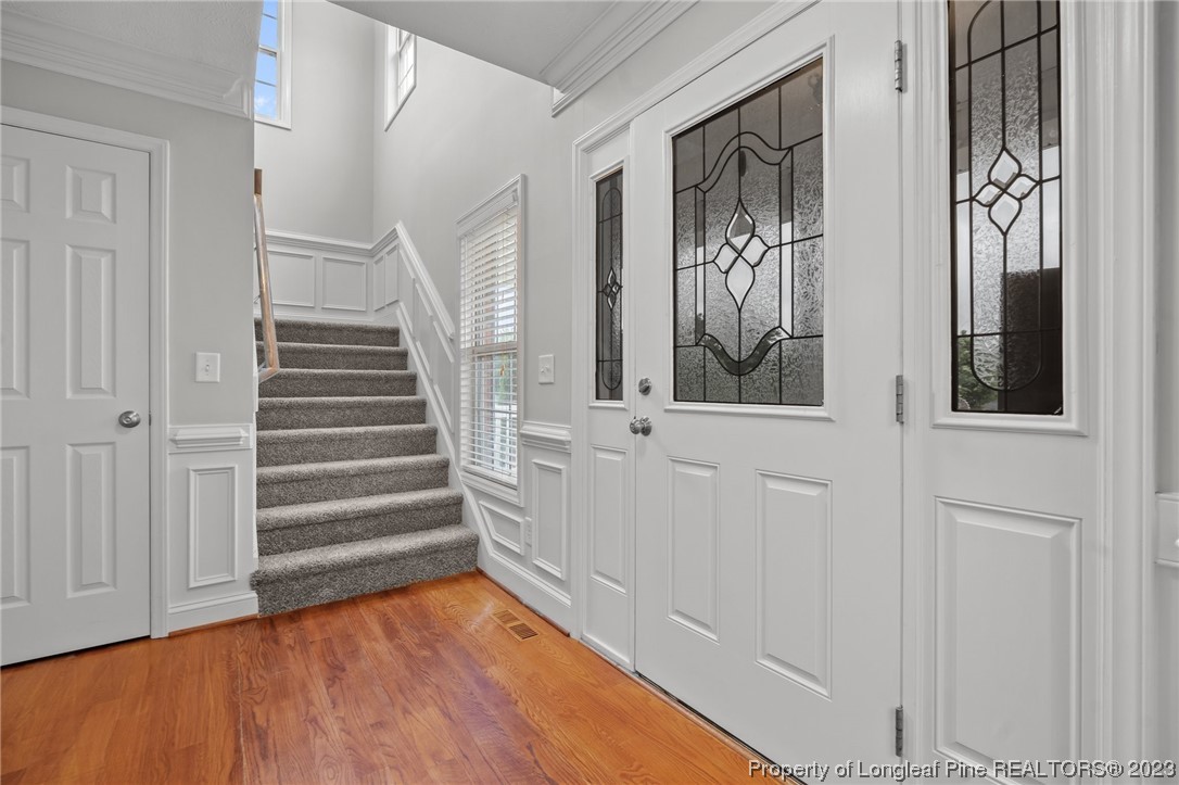 195 Culpepper Road Cameron, NC 28326 - Photo 5 of 46 a view of an entryway with wooden floor