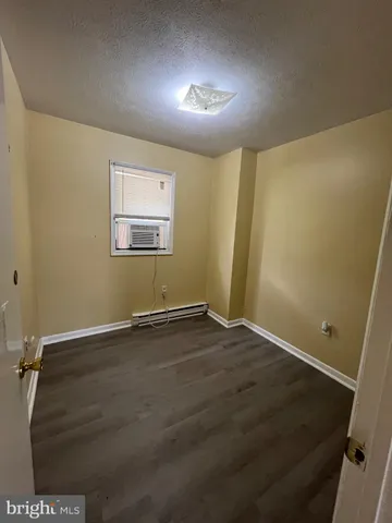 an empty room with a workbench