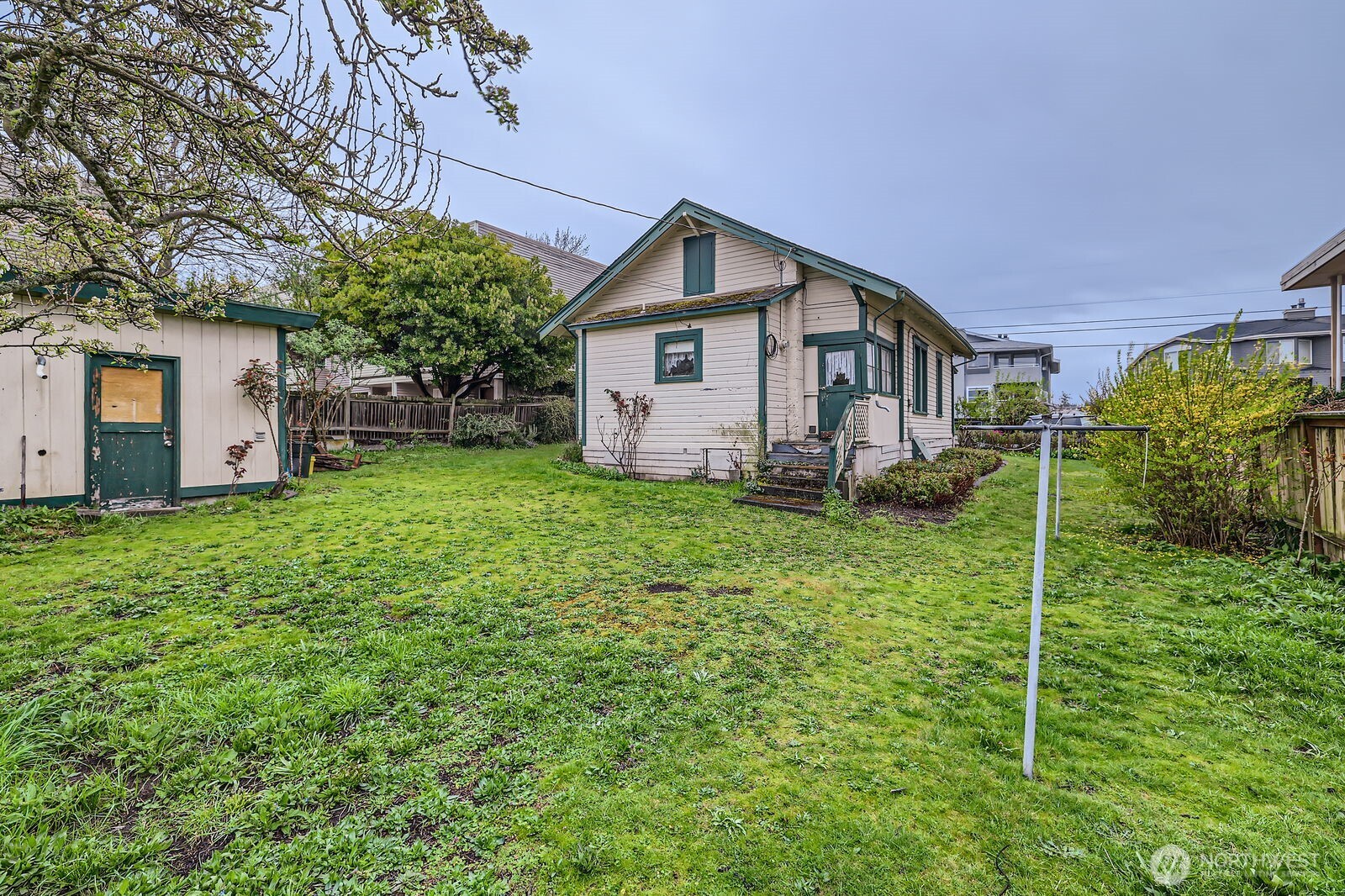 621 Daley Street Edmonds, WA 98020 - Photo 10 of 19 a view of a house with yard and a tree