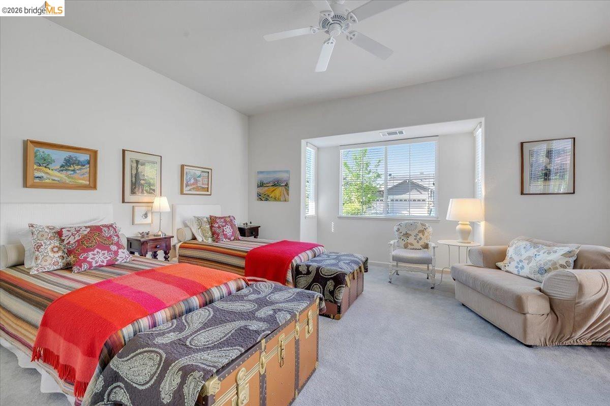 258 Rock Ridge Lane Copperopolis, CA 95228 - Photo 35 of 47 Bedroom featuring light carpet and ceiling fan