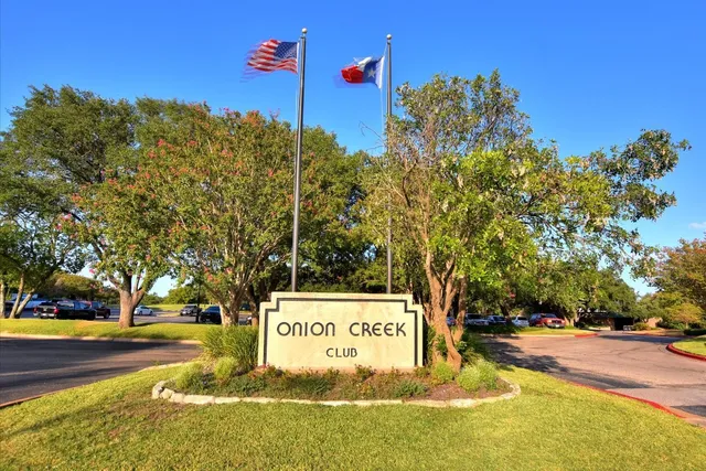 a sign board with parking space