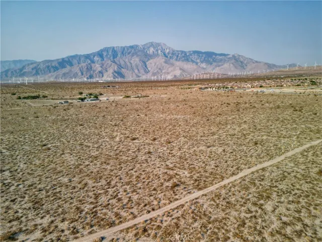 a view of a large body of water and mountain