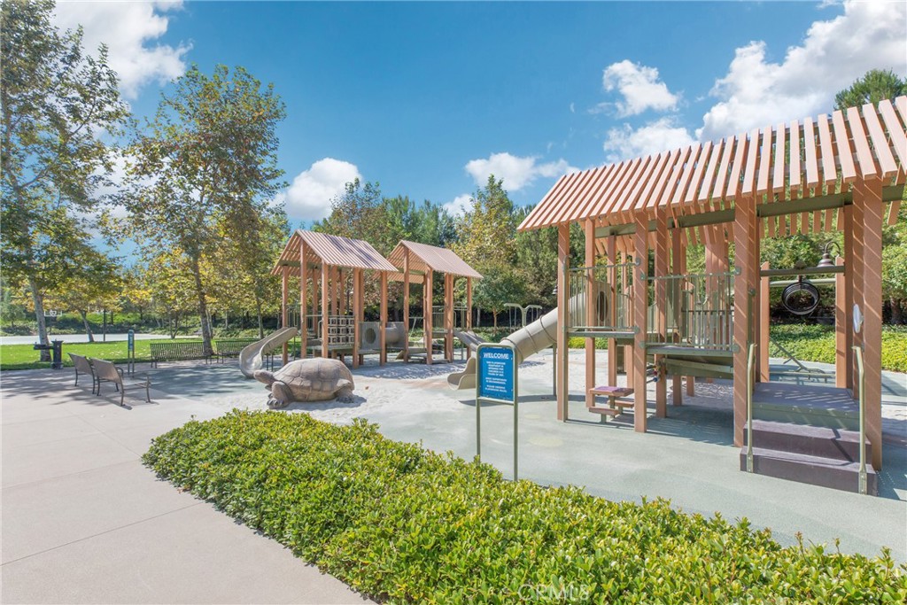 60 Bianco Irvine, CA 92618 - Photo 5 of 8 a view of a house with a patio and a yard