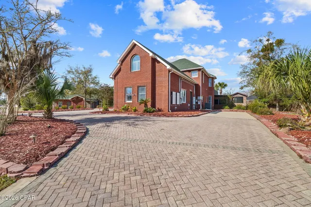 $975,000 | 4409 Deer Point Cove Lane, Panama City, FL 32404