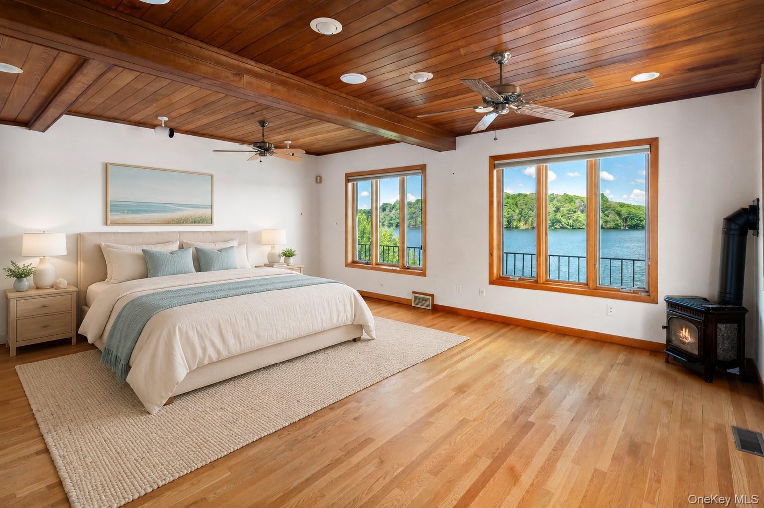 41 Tamarack Road Mahopac, NY 10541 - Photo 27 of 41 Wake up to the lake every morning in this main level primary suite (digitally staged)