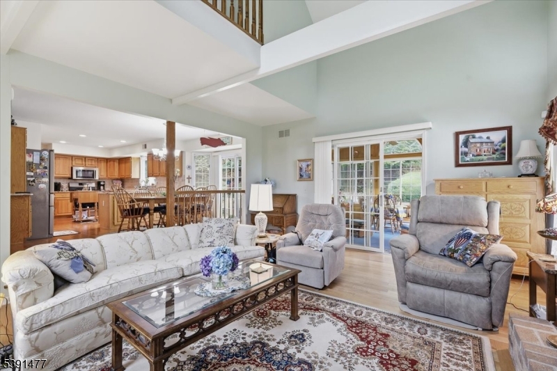 42 Copper Penny Road Flemington, NJ 08822 - Photo 10 of 39 a living room with furniture wooden floor and a large window
