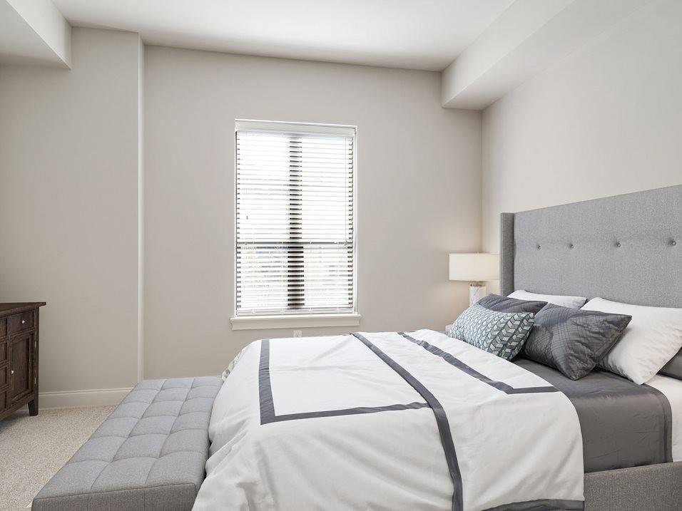 92 West Paces Ferry Road Northwest, Unit 7020 Atlanta, GA 30305 - Photo 23 of 47 a bedroom with a bed and a window