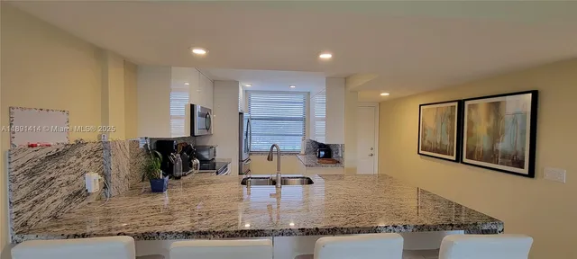 $329,000 | 1530 Whitehall Drive, Unit 405, Davie, FL 33324