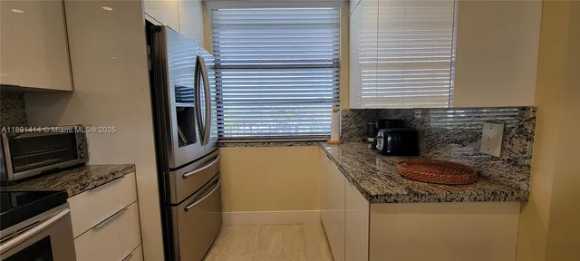 $329,000 | 1530 Whitehall Drive, Unit 405, Davie, FL 33324