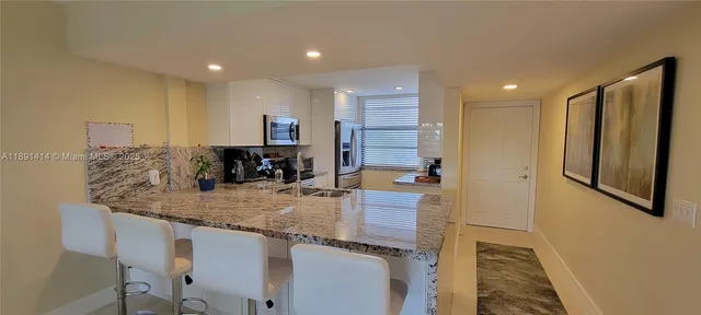 $329,000 | 1530 Whitehall Drive, Unit 405, Davie, FL 33324