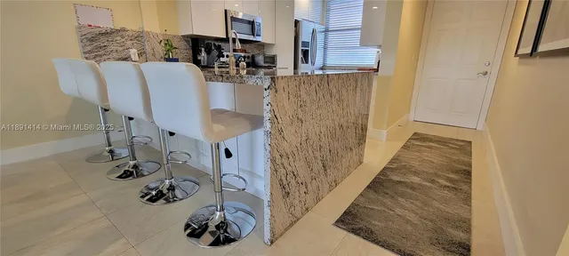 $329,000 | 1530 Whitehall Drive, Unit 405, Davie, FL 33324