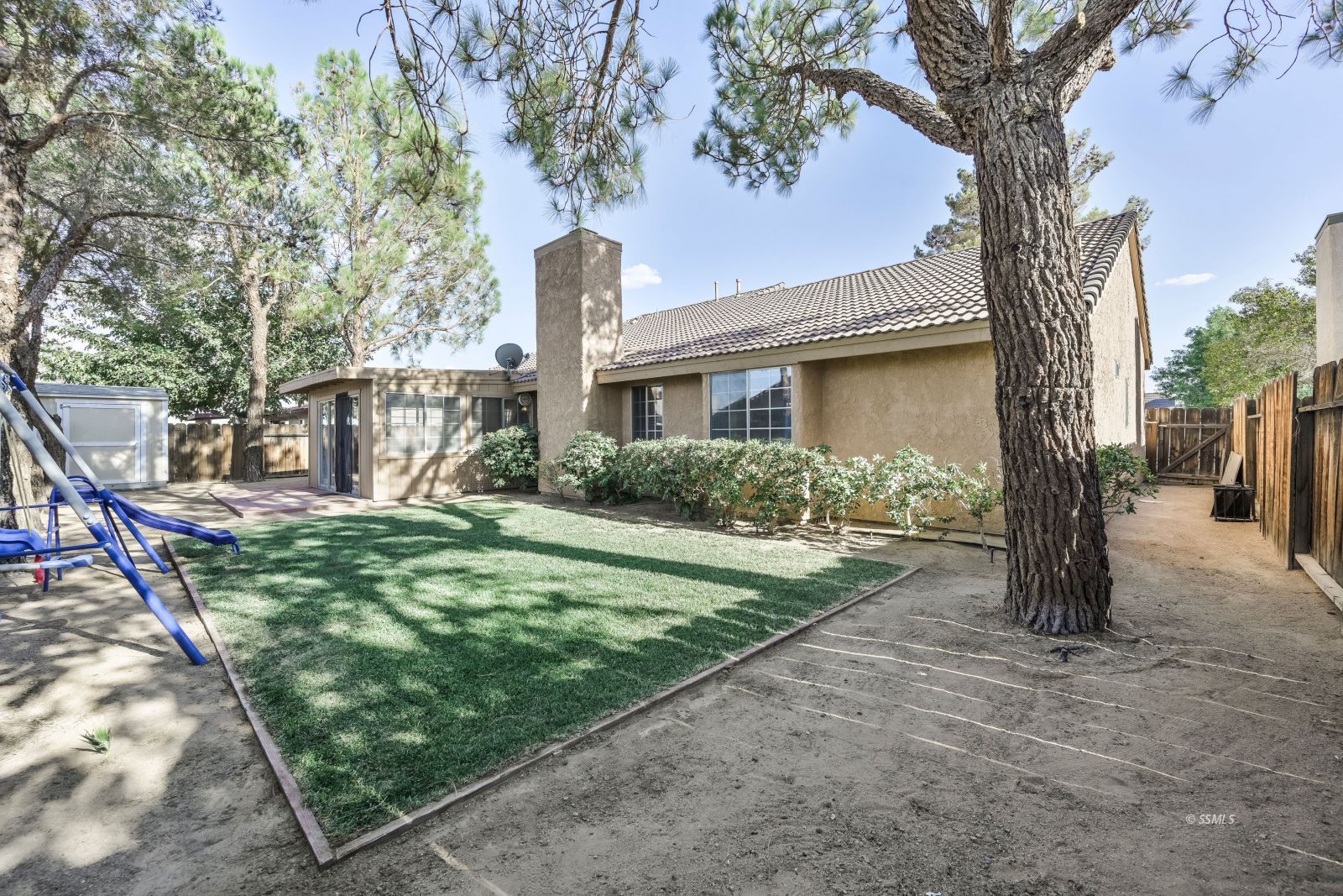 404 Veada Avenue Ridgecrest, CA 93555 - Photo 33 of 33 a front view of a house with garden