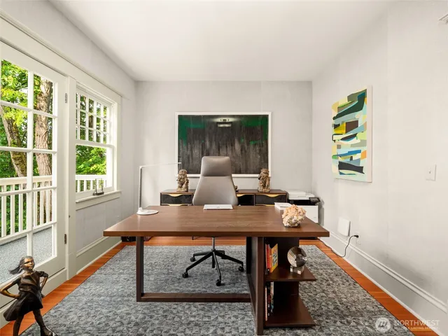 a view of a workspace with furniture