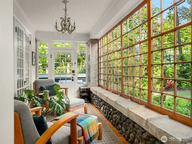 a room with furniture and a large window