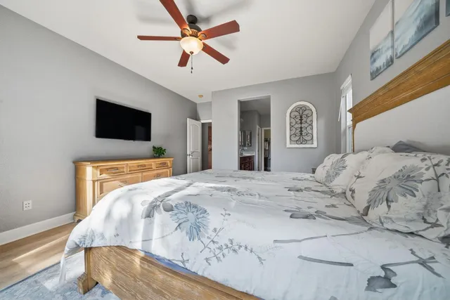 an aerial view of a house with a yard lake view