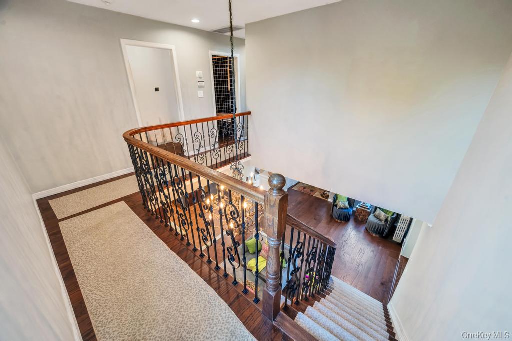 357 Wynsum Avenue Merrick, NY 11566 - Photo 25 of 40 a view of entryway with wooden floor