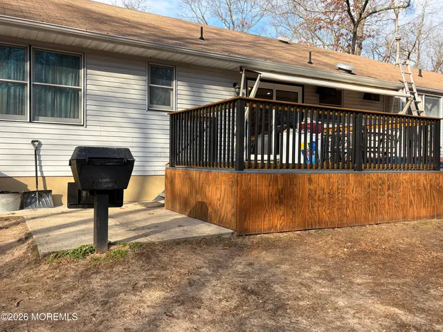 a front view of a house with parking area