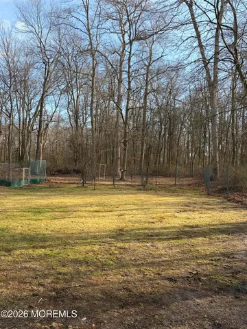 a view of a swimming pool with an outdoor space