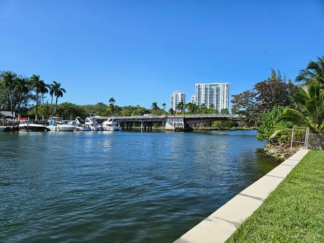 a view of swimming pool having outdoor seating