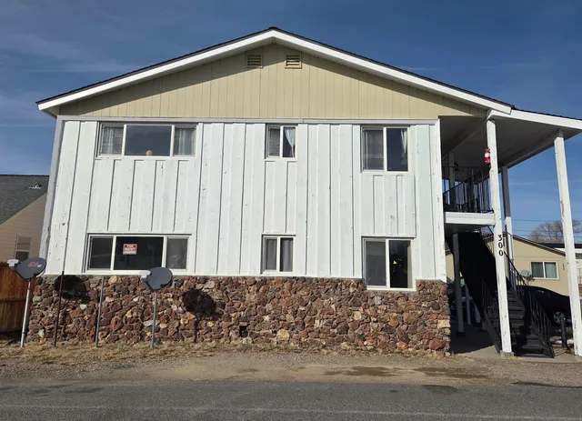 a front view of a house with garage