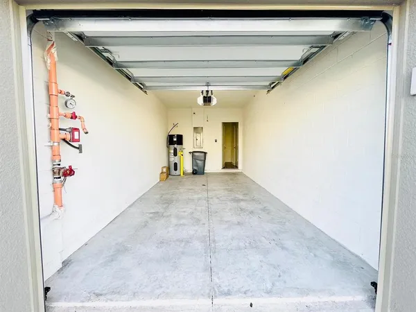 an empty room with a bathroom