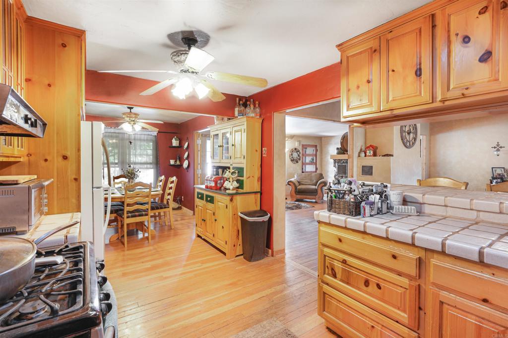 29012 Oak Lane Pine Valley, CA 91962 - Photo 2 of 38 a kitchen with stainless steel appliances granite countertop a stove and cabinets