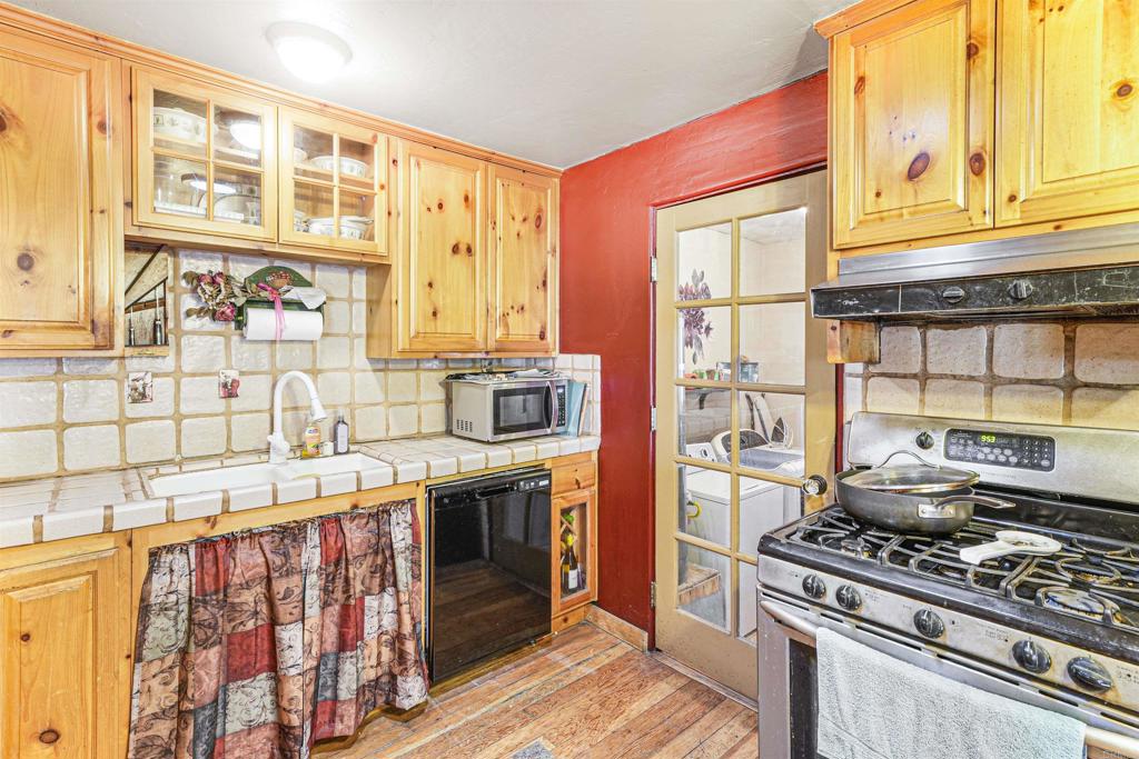 29012 Oak Lane Pine Valley, CA 91962 - Photo 3 of 38 a kitchen with stainless steel appliances granite countertop a stove and a refrigerator