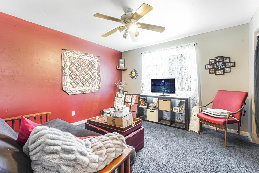 29012 Oak Lane Pine Valley, CA 91962 - Photo 35 of 38 a bedroom with a bed and a chair