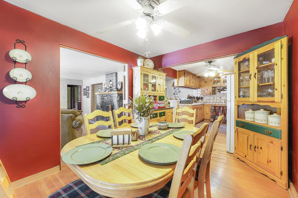 29012 Oak Lane Pine Valley, CA 91962 - Photo 4 of 38 a dining room with furniture and a floor to ceiling window