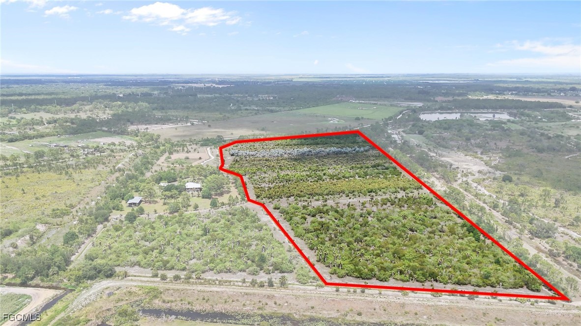 2460 Christopher Lane Clewiston, FL 33440 - Photo 5 of 8 a view of swimming pool from a balcony
