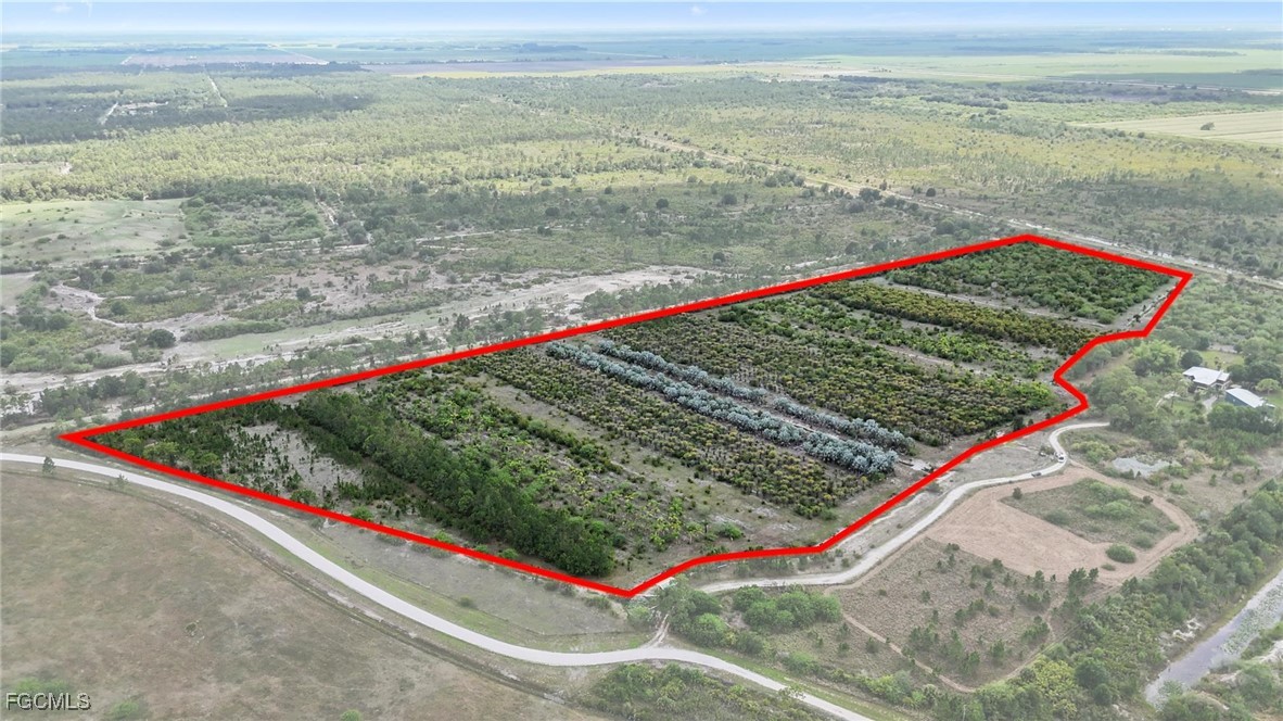2460 Christopher Lane Clewiston, FL 33440 - Photo 7 of 8 a view of a pool with an outdoor space