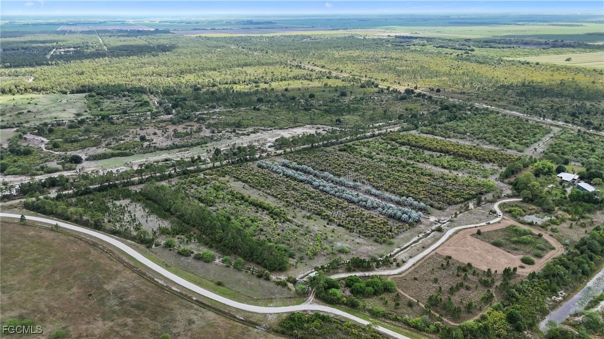 2460 Christopher Lane Clewiston, FL 33440 - Photo 8 of 8 a view of a field with an ocean view