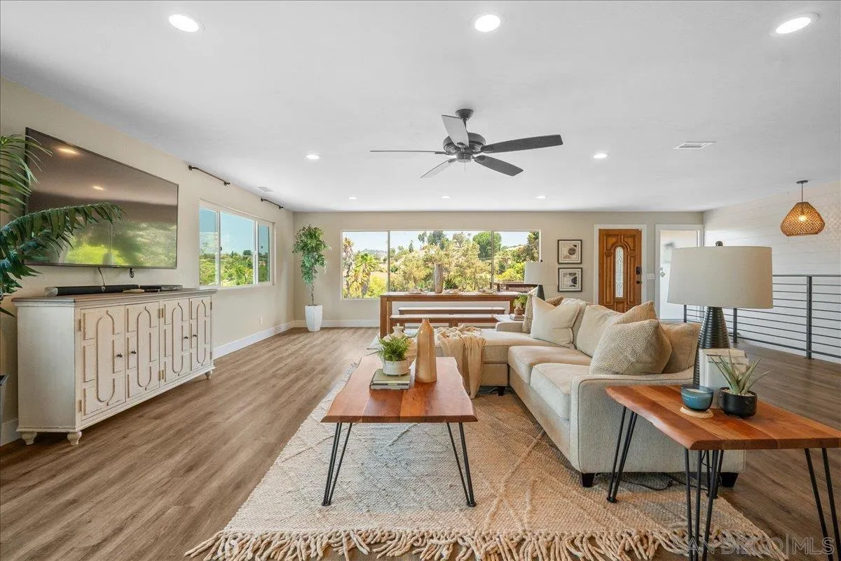 20809 Viento Valle Escondido, CA 92025 - Photo 2 of 23 a living room with furniture and a flat screen tv