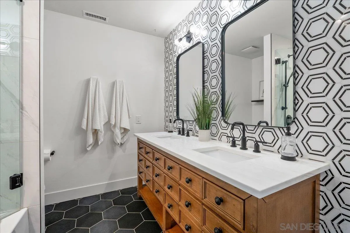20809 Viento Valle Escondido, CA 92025 - Photo 8 of 23 a bathroom with a sink and a mirror
