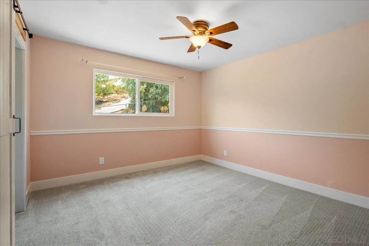 20809 Viento Valle Escondido, CA 92025 - Photo 9 of 23 an empty room with a window
