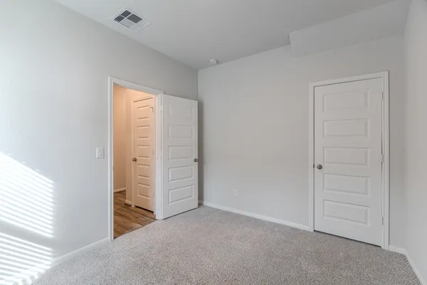 an empty room with closet