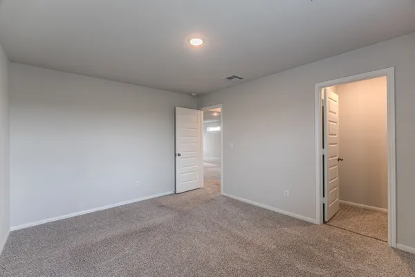 an empty room with an entryway