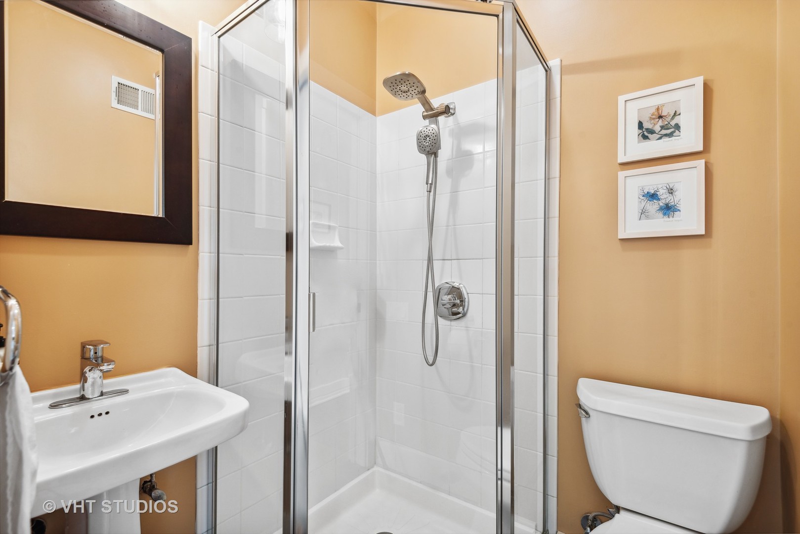 561 Elder Lane Winnetka, IL 60093 - Photo 15 of 26 a bathroom with a toilet sink and shower