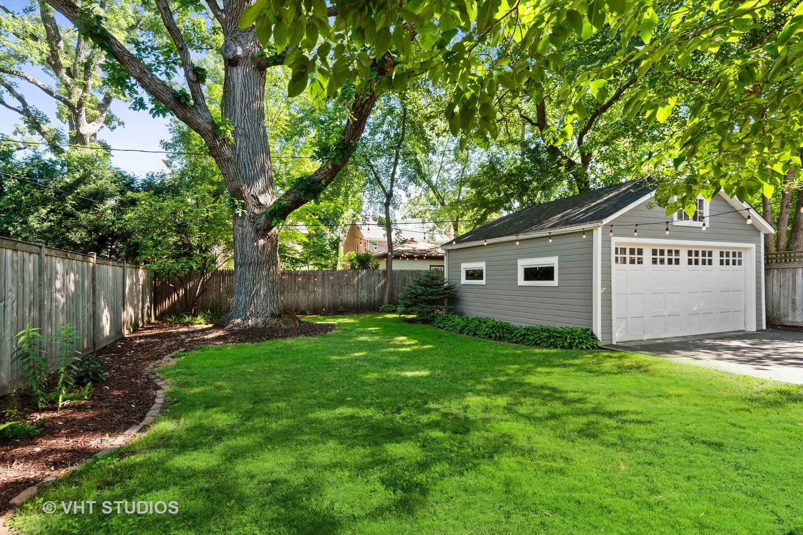 561 Elder Lane Winnetka, IL 60093 - Photo 21 of 26 a view of a back yard of the house