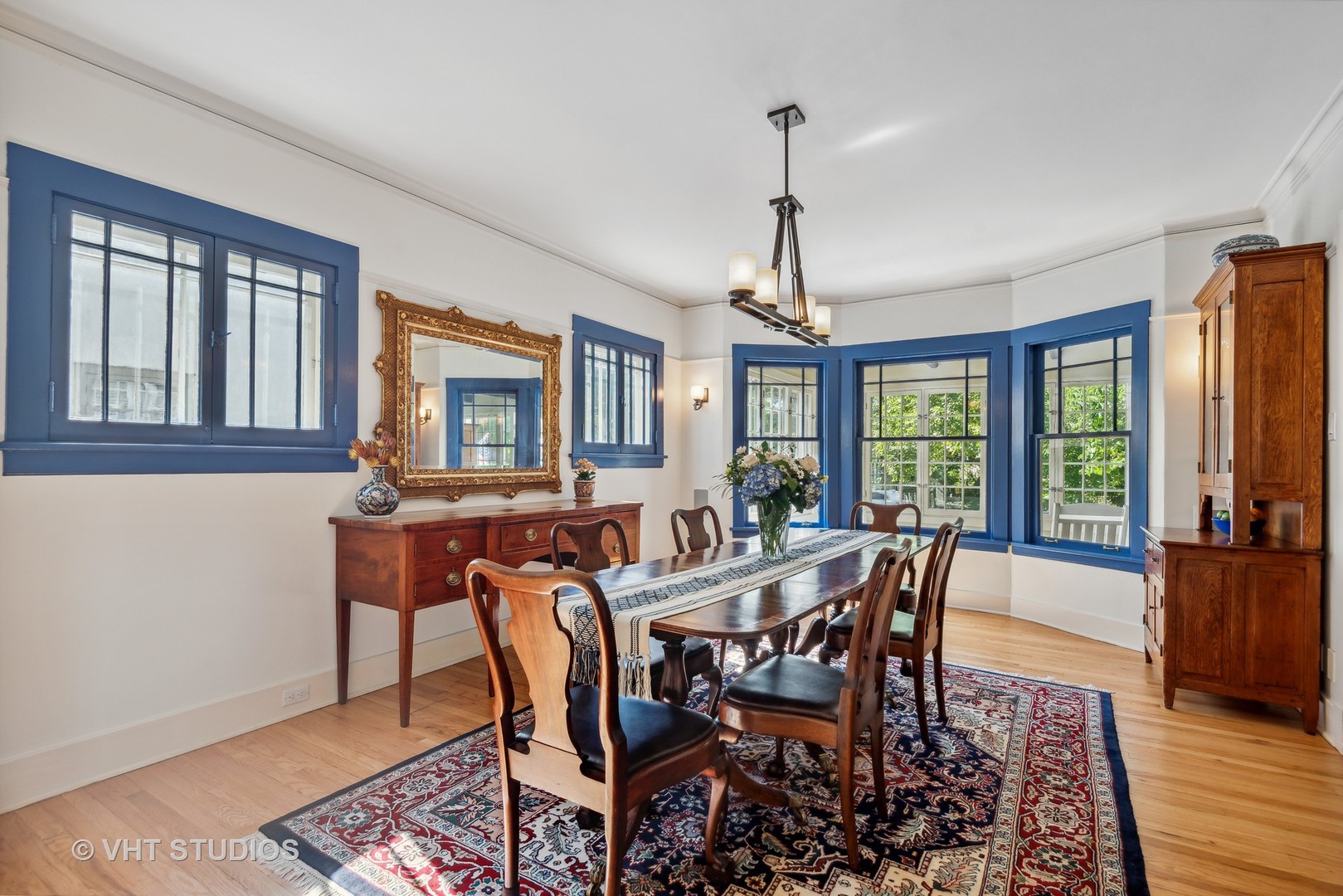 561 Elder Lane Winnetka, IL 60093 - Photo 6 of 26 a view of a dining room with furniture window and wooden floor