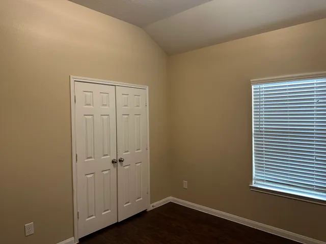a view of a livingroom with wooden floor