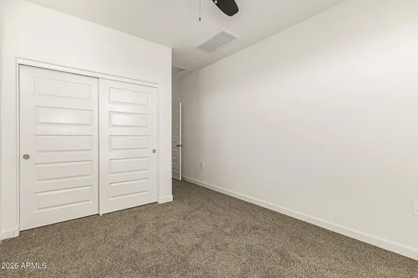 an empty room with closet
