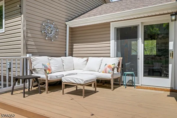 a outdoor space with a large window and couch