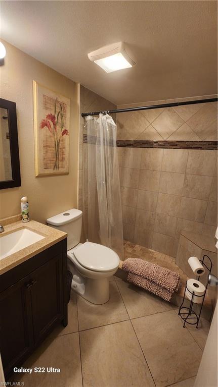 3325 Airport Road North, Unit J3 Naples, FL 34105 - Photo 9 of 13 a bathroom with a sink toilet and shower