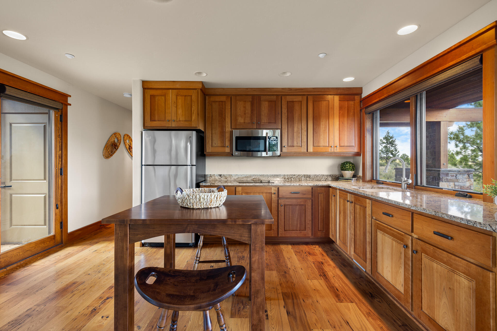 18883 Sutherland Court Bend, OR 97702 - Photo 42 of 70 Light-filled open layout blending living, dining, and kitchen areas for effortless flow.