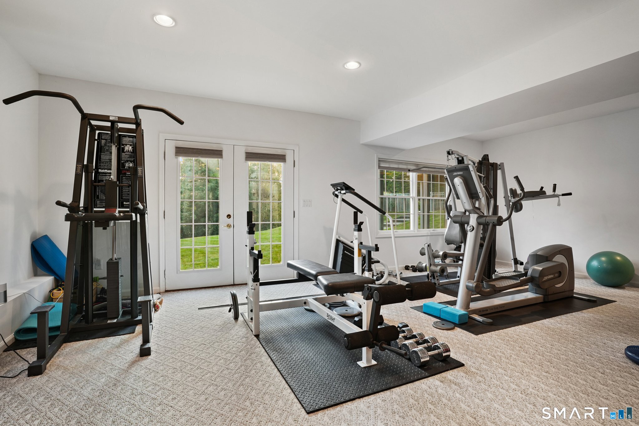 65 Pine Ridge Road Wilton, CT 06897 - Photo 22 of 27 Old photo. Gym equipment relocated to separate room with matt flooring, mirrors, TV. New photos coming on 8/26
