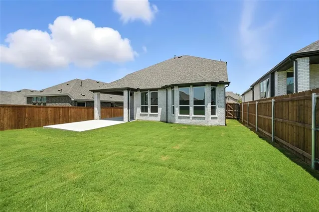 a view of a house with a garden